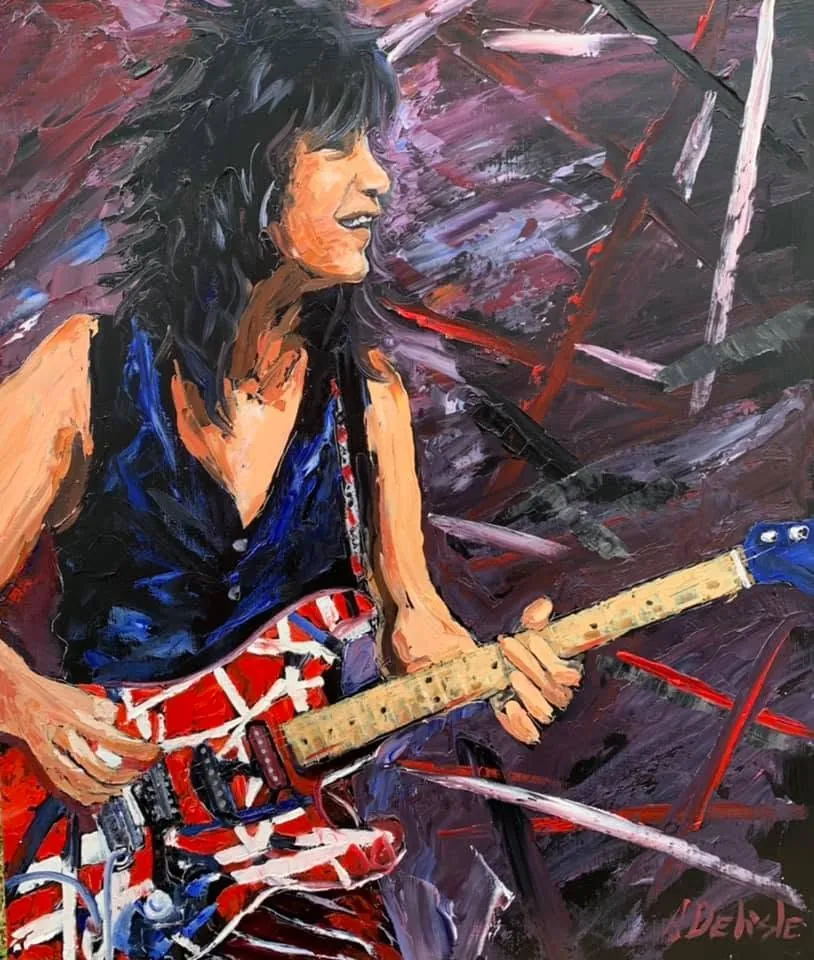 Portrait d'Eddie Van Halen jouant de sa guitare rayée rouge, blanche et noire