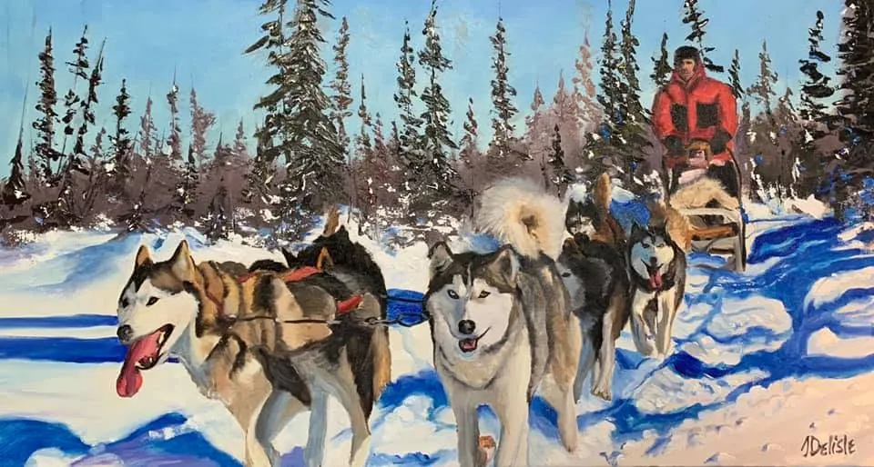 La langue à terre : des chiens de traîneau tirent un traîneau dans la neige, en forêt